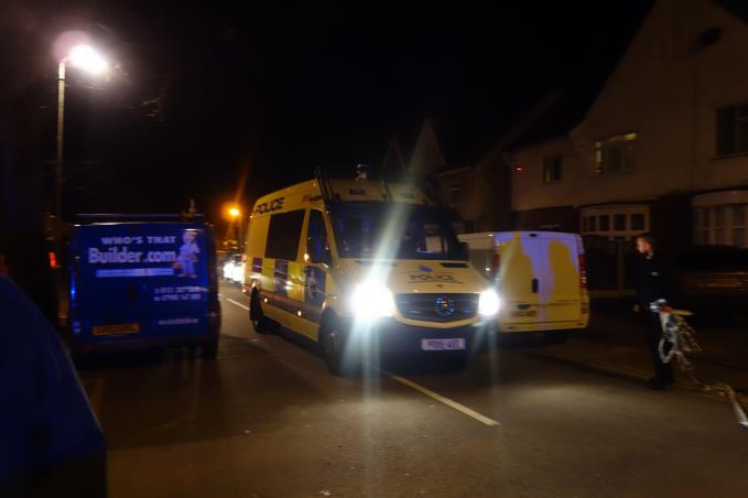 A man is arrested and taken away in this van after the five hour stand off in Oxford Drive