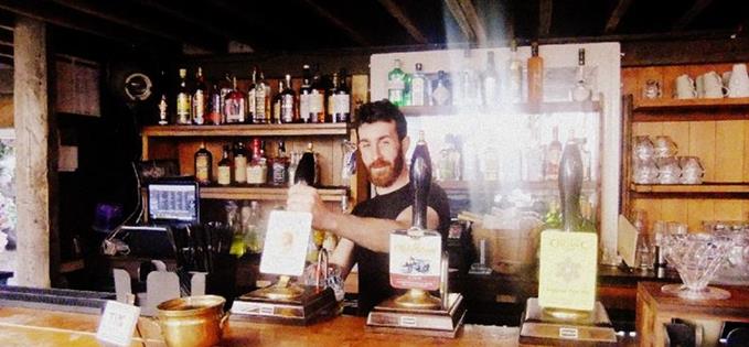 Liam Naughton gets stuck in behind the bar in the Kazimier Garden