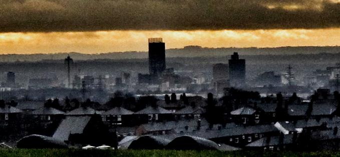 Storm approaching: Manchester from above Shaw