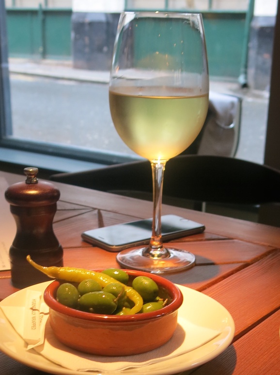 White wine with olives