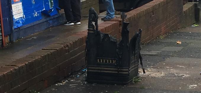 Look, heres a bin – oh, someones set fire to it.