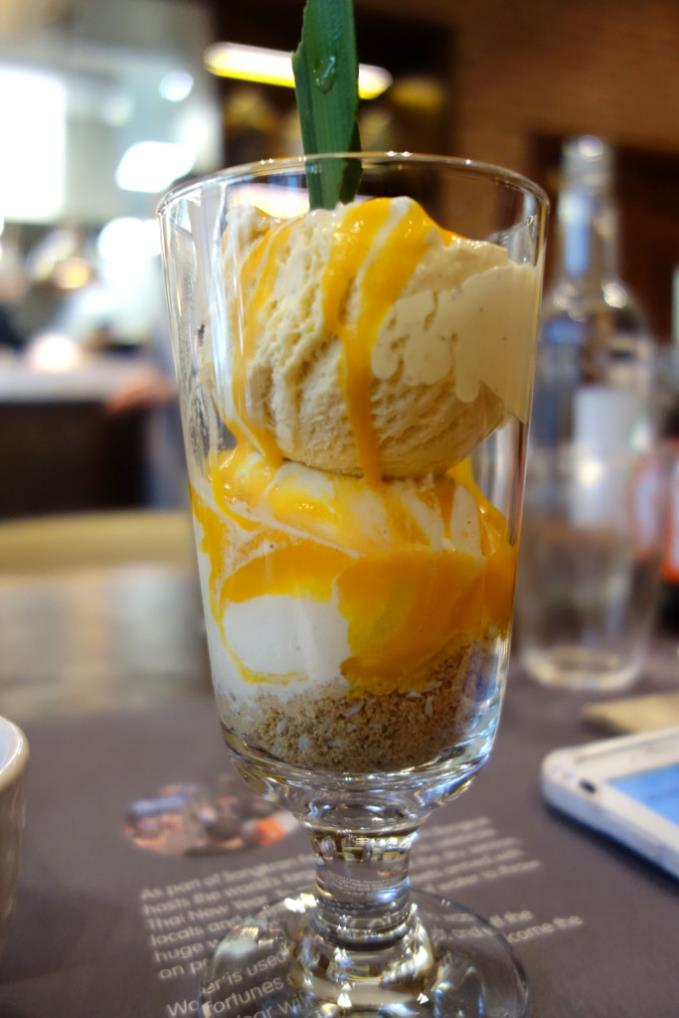 Ice cream sundae (v) (n) coconut, Thai tea and vanilla ice cream with crumbled cookies, strawberry or mango sauce £4.95