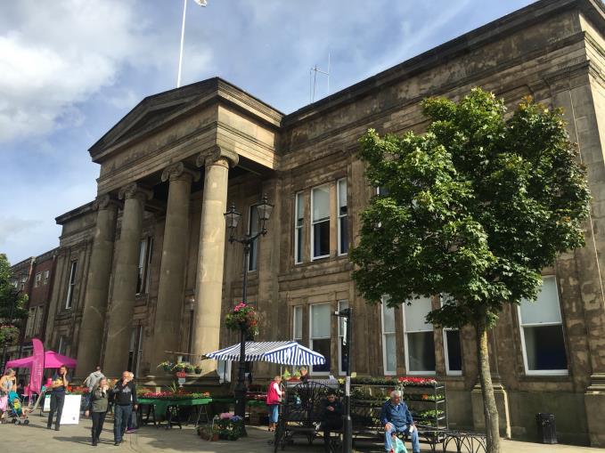 The former Town Hall dominates the square