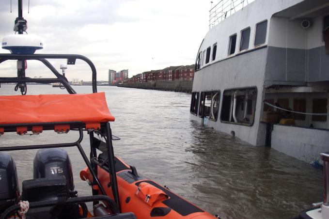 The Royal Iris sinks into the mud on the Thames