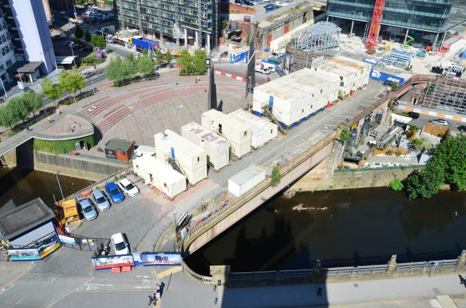 Manchester and Salford kissing at Greengate Square directly below the tower