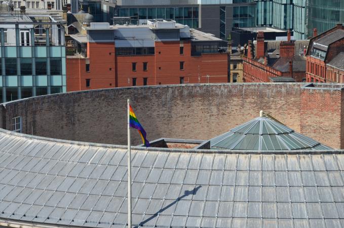 Pride flag the curve of the building and the 