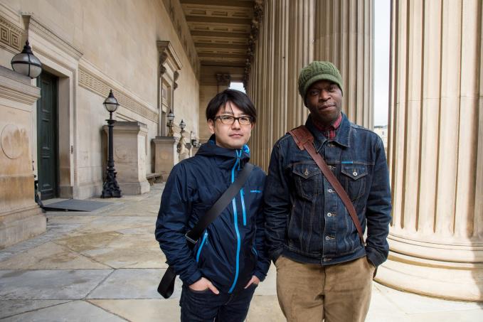 Koki Tanaka_with_Emeka_Onoura, orginal particpant of the Youth Training Scheme Protest in Liverpool. Photo Mark McNulty. Image courtesy of Liverpool Biennial.jpg