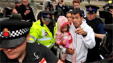 Carlos Tevez arrives back at Manchester City