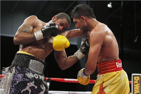 Amir Khan's controversial fight with Lamont Peterson in Washington DC, Dec 2011