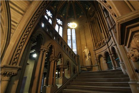 The grand staircase with a statue of John Bright who spoke at the opening event