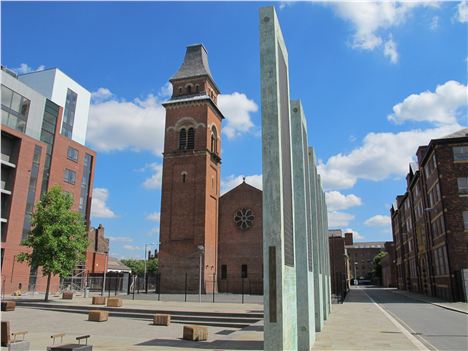 Cutting Room Square and St Peter's Church in the background