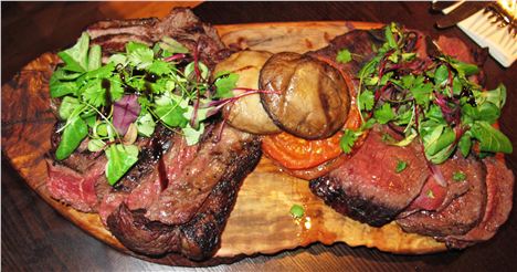 A birdseye view of Bohemia's Steak Feast Platter. You'll want to swoop on it.