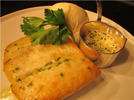 Baked halibut with rosemary sauce