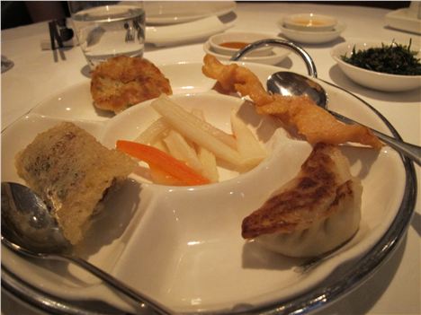 Platter, Vietnamese spring roll on the left, saying, 