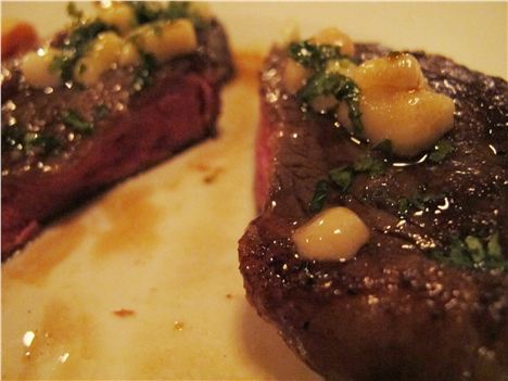 Steak adorned with bone marrow at Beagle