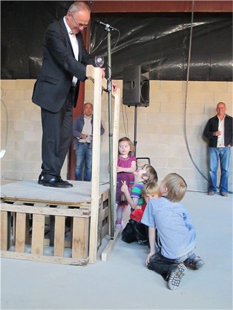 Sir Richard Leese engaging with young constituents at an Ancoats opening