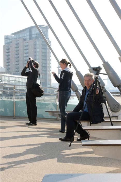 Tourists on the footbridge from the Imperial War Museum North leading to Damson