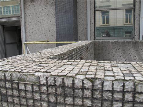 Crumbling mosaics from the original building