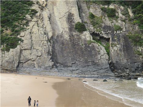 Dwarfed By The Immensity Of The Cliffs