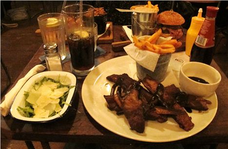 The ribs with rocket and parmesan salad