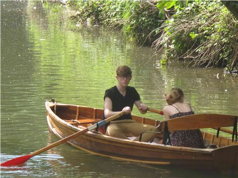 Student Couple On The River