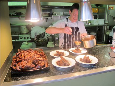 Anthony dishing out ribs