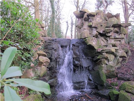 A grotto waterfall in Abney Hall Park