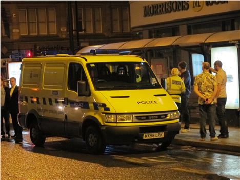 Police give friendly advice in Piccadilly