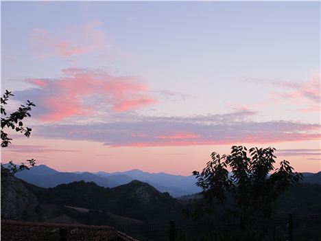 Sunset over the mountains from the terrace at Casa Marcial