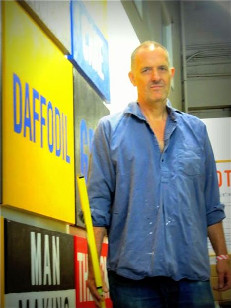 Bill Drummond hanging his work at Manchester Contemporary
