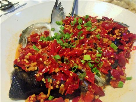 Spicy salmon head with an exciting range of chilli action