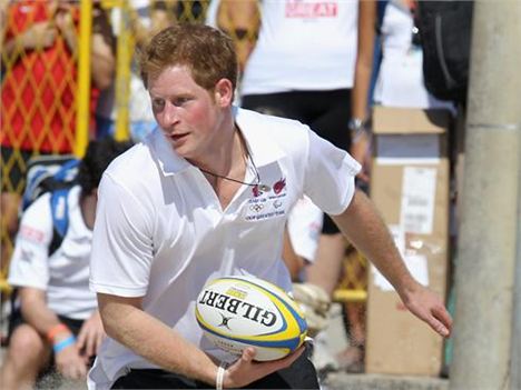 Prince Harry playing rugby