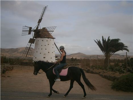 Fuertoventura Riding On Apache Past Windmill