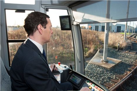 Chancellor George Osborne on a visit to the new airport line