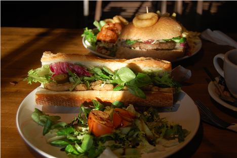 'Steak' & 'Cheese' sandwich and Big 'Cheesy' in the background