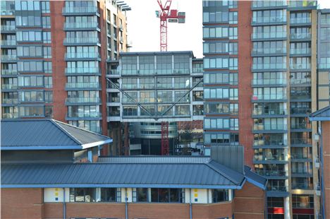 View through the Leftbank apartment development in Spinningfields